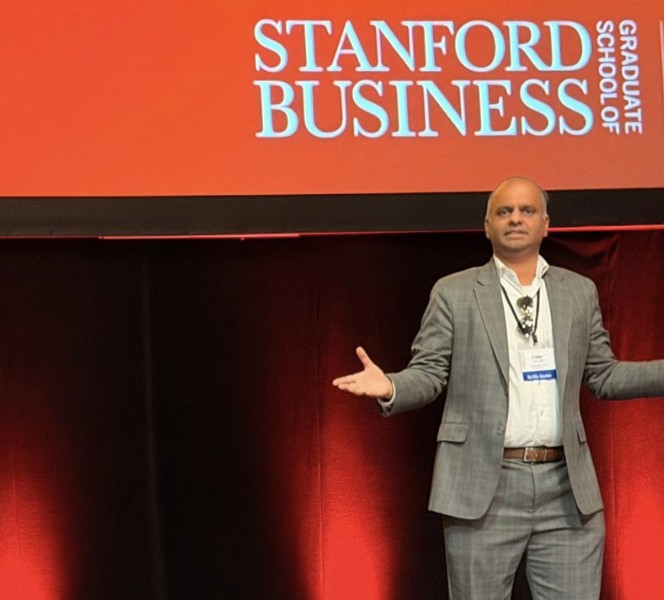 Vibhu Narwekar speaking on the ROI of AI at the Stanford Graduate School of Business